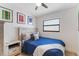 Cozy bedroom with natural light, decorative art, and comfortable furnishings at 3204 Tradewinds Trl, Orlando, FL 32805
