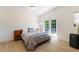 Relaxing bedroom with access to outdoor space and lots of natural light at 3204 Tradewinds Trl, Orlando, FL 32805
