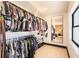 Walk-in closet with ample storage space and built in shelving at 3204 Tradewinds Trl, Orlando, FL 32805