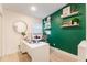 Bright home office space with a large desk and unique shelving accents at 3204 Tradewinds Trl, Orlando, FL 32805