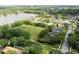 Aerial view of house location next to large grassy field at 341 Kirkhill St, Ocoee, FL 34761