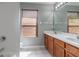 Well-maintained bathroom with double sink vanity and combined tub and shower at 341 Kirkhill St, Ocoee, FL 34761
