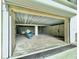 Spacious garage perfect for storing vehicles, jet ski and other equipment at 4301 Down Point Ln, Windermere, FL 34786