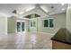 A spacious living room with tile flooring and lots of natural light at 4301 Down Point Ln, Windermere, FL 34786