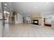 Spacious living area with fireplace and large tile flooring and modern design at 4301 Down Point Ln, Windermere, FL 34786