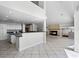 Open-concept living space featuring a fireplace, tile flooring, and modern design elements at 4301 Down Point Ln, Windermere, FL 34786