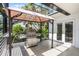 Outdoor kitchen with a built-in grill and prep area, perfect for alfresco dining and entertaining at 4301 Down Point Ln, Windermere, FL 34786