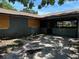 Exterior view of the side of the home, which shows that it needs some repairs at 4302 Seybold Ave, Orlando, FL 32808