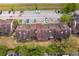 Aerial view showing location of townhome with private patios and convenient parking at 5060 Downing St # 6, Orlando, FL 32839