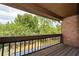 Balcony with view of lush trees at 5060 Downing St # 6, Orlando, FL 32839