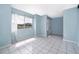 Bright living room with lots of sunlight and ceramic tile flooring at 5060 Downing St # 6, Orlando, FL 32839