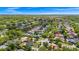 A high view showcases the location of a home in a lush neighborhood with mature trees at 532 Darcey Dr, Winter Park, FL 32792