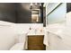 Contemporary bathroom featuring tiled walls, modern vanity, and sleek fixtures offering a blend of style and functionality at 532 Darcey Dr, Winter Park, FL 32792