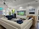 Stylish lobby with contemporary furnishings, large TV, and package storage at 5354 Diplomat Ct # 105, Kissimmee, FL 34746
