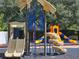 Fun playground area with colorful slides, climbing structures, and a safe, padded ground at 5354 Diplomat Ct # 105, Kissimmee, FL 34746