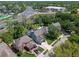 Overhead aerial view of the property showcases a maturely landscaped yard at 5388 Birchbend Loop, Oviedo, FL 32765