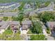 Aerial view of the property featuring a neatly landscaped yard and inviting curb appeal at 5388 Birchbend Loop, Oviedo, FL 32765