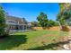 Spacious fenced backyard with pool and lush lawn at 5388 Birchbend Loop, Oviedo, FL 32765