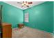 Unfurnished bedroom with plush carpeting, a window, and ample natural light at 5388 Birchbend Loop, Oviedo, FL 32765