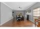 Elegant living room featuring hardwood floors and direct access to the backyard at 5388 Birchbend Loop, Oviedo, FL 32765