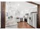 Modern kitchen with stainless steel appliances, granite countertops, and white cabinetry at 5395 Emerald Isle Drive # 1011, Orlando, FL 32812