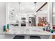 Modern kitchen with stainless steel appliances, granite counters, and white cabinetry, perfect for culinary enthusiasts at 5395 Emerald Isle Drive # 1011, Orlando, FL 32812