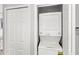 Laundry closet with stacked washer and dryer, with easy access at 5395 Emerald Isle Drive # 1011, Orlando, FL 32812