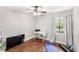 Bright office with a window, desk, and hardwood floors and modern decor at 5395 Emerald Isle Drive # 1011, Orlando, FL 32812