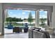 Inviting outdoor living space with a pool and golf course views at 5640 Brookline Dr, Orlando, FL 32819