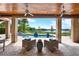 Inviting outdoor living space with a pool, golf course views, and comfortable seating at 5640 Brookline Dr, Orlando, FL 32819