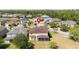 An aerial view shows a neighborhood of single-Gathering homes in a suburban area at 5803 Cheshire Cove Ter, Orlando, FL 32829