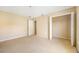 Bedroom featuring carpet flooring and a closet with an opened sliding door at 5803 Cheshire Cove Ter, Orlando, FL 32829