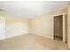 Bedroom featuring carpet flooring and a closet with an opened sliding door at 5803 Cheshire Cove Ter, Orlando, FL 32829