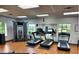 Fitness center featuring treadmills, weight equipment, and mirrors to enhance your workout experience at 5803 Cheshire Cove Ter, Orlando, FL 32829