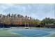 Community tennis court for active recreation and sports enjoyment at 5803 Cheshire Cove Ter, Orlando, FL 32829