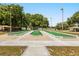 This recreation area features a bocce ball court, picnic tables, and mature trees for shade at 5962 Sw 98Th Street Rd, Ocala, FL 34476