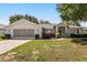 Charming single-story home with manicured landscaping and a two-car garage at 5962 Sw 98Th Street Rd, Ocala, FL 34476