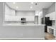Beautiful kitchen with stainless steel appliances, breakfast bar, and ample counter space at 5962 Sw 98Th Street Rd, Ocala, FL 34476