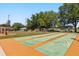 Enjoy friendly games at the shuffleboard court, with covered seating areas in a lush landscape at 5962 Sw 98Th Street Rd, Ocala, FL 34476