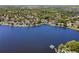 Expansive lakefront community view showcasing numerous homes with boat docks and water access at 8616 Port Said St, Orlando, FL 32817