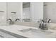Elegant bathroom featuring double sinks, marble countertops, and a sleek design for a spa-like experience at 8616 Port Said St, Orlando, FL 32817