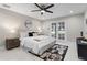 Bedroom with neutral tones, ceiling fan and patio doors to outside at 8616 Port Said St, Orlando, FL 32817