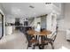 Open-concept kitchen flowing into the dining area with updated appliances and large island at 8616 Port Said St, Orlando, FL 32817