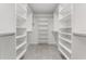 Spacious walk-in closet with custom shelving and ample storage for an organized wardrobe at 8616 Port Said St, Orlando, FL 32817