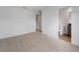 Spacious bedroom features neutral carpet, light walls, and attached bathroom at 8802 Positivity Dr, Kissimmee, FL 34747
