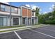 Modern townhomes feature a neutral color palette, sleek lines, and reserved parking at 8802 Positivity Dr, Kissimmee, FL 34747
