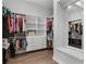 Spacious walk-in closet with custom shelving and ample storage space at 9250 Neher St, Orlando, FL 32827