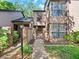 Inviting two-story home with a private gated entrance and lush, mature landscaping at 940 Douglas Ave # 118, Altamonte Springs, FL 32714
