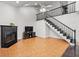 Spacious living room with a fireplace and stairway to a second level at 940 Douglas Ave # 118, Altamonte Springs, FL 32714
