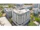 An aerial view of high rise residential building with curved balconies at 100 S Eola Dr # 1102, Orlando, FL 32801